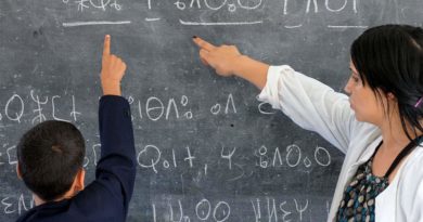 Morrocan kid learning Tifinagh in School